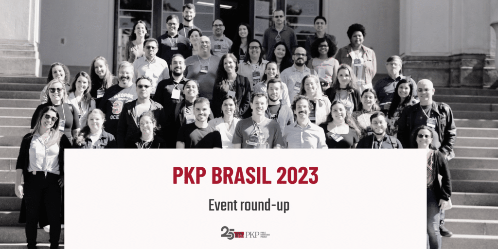 Attendees at the PKP Brasil 2023 event at the Istituto Biologico de Sao Paulo stairs.
